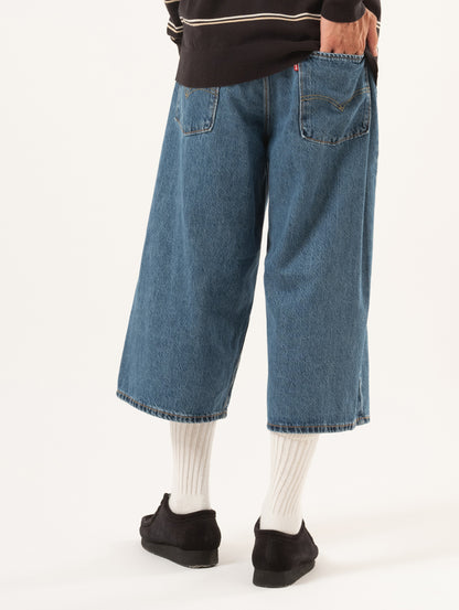 ツイステッド バギージーンズ カプリ ミディアムインディゴ