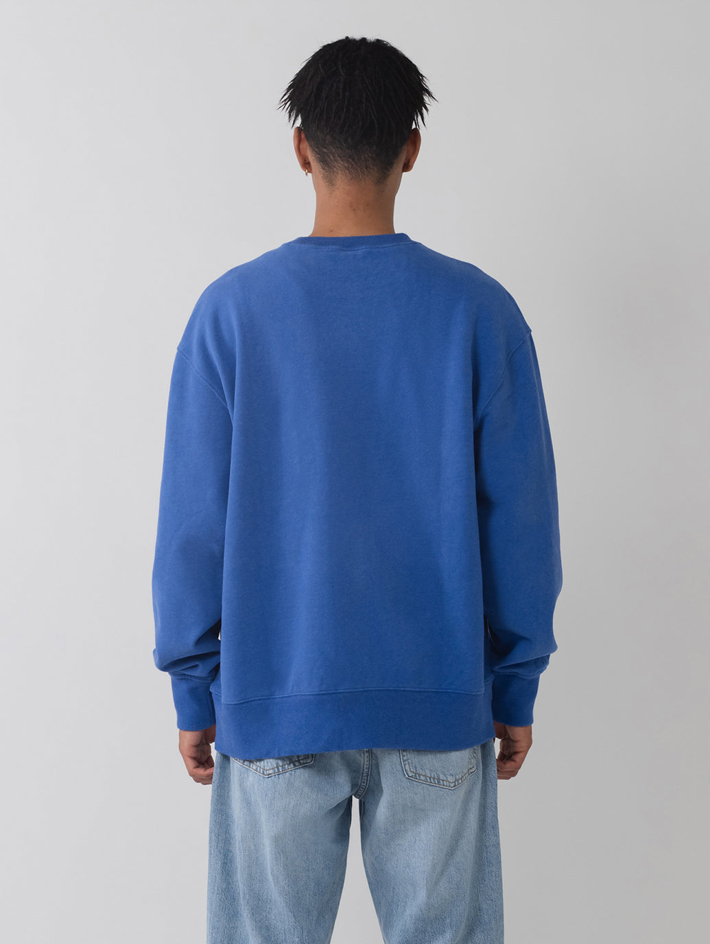 グラフィック クルーネックスウェットシャツ